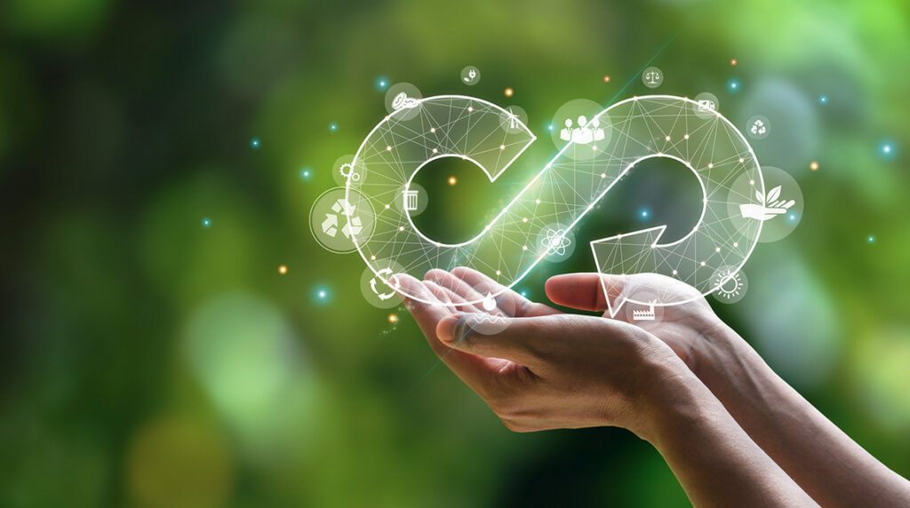 Concept of a circular economy with hands holding a circular symbol.